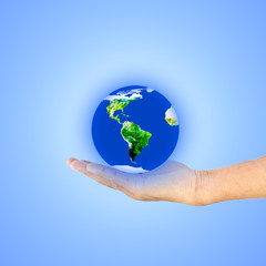 Globe ,earth in human hand against