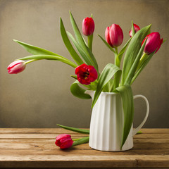 Still life with tulips bouquet on wooden table © maglara