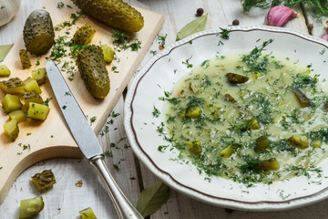 Chopped gherkins, dill and garlic as an ingredient for cucumber