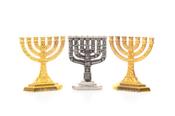 Three Menorah, one silver and two another golden