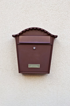 letter post box on a white wall