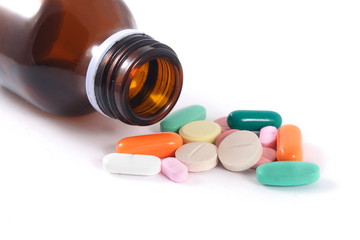 Various pills and bottle