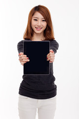 Woman holding tablet computer isolated on white background.