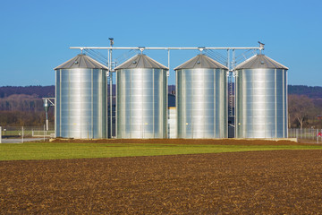 silver silo in rural landscape © travelview