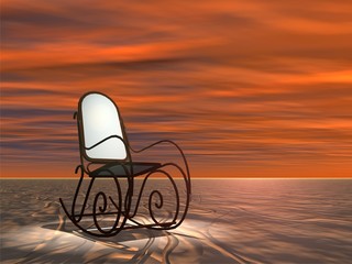 Conceptual armchair standing in dessert at sunset
