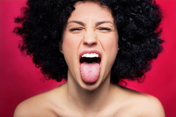 Woman sticking her tongue out
