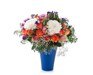 Fresh flowers in a blue vase