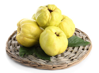 sweet quinces with leaves, isolated on white