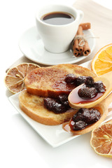 White bread toast with jam and cup of coffee, isolated on white