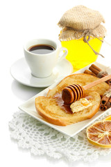 White bread toast with honey and cup of coffee, isolated