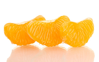 Ripe sweet tangerine  cloves, isolated on white