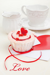 Strawberry cupcake on a table
