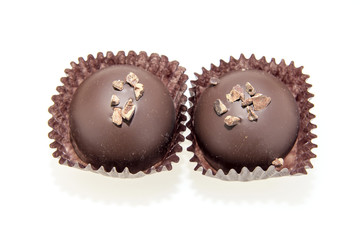 Two Dark Chocolate Truffles Isolated