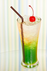 Ice drink whith red cherry