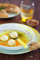 Soup with turkey meatballs, carrots and tselery, selective focus