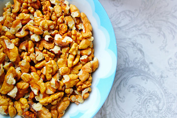 A bowl of walnuts , baking ingredient