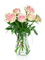 Bouquet of pink roses in a vase, isolated on white