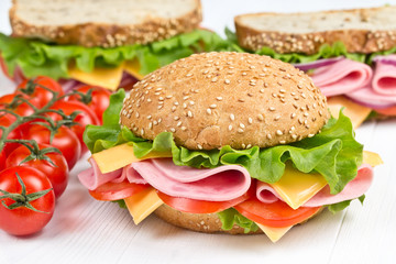 bun and sandwiches with ham snd cheese