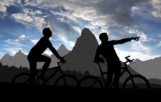 silhouette  cyclists  in sunset