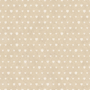 Seamless retro pattern of Valentine's hearts on paper texture.