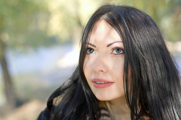 nice young woman in autumn park