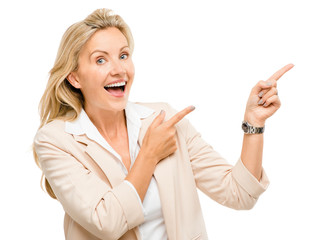 Mature business woman pointing empty copy space smiling isolated