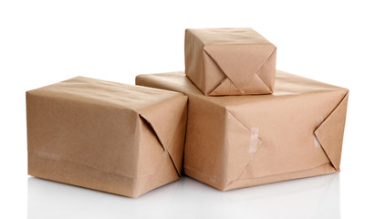 parcels boxes with kraft paper, isolated on white