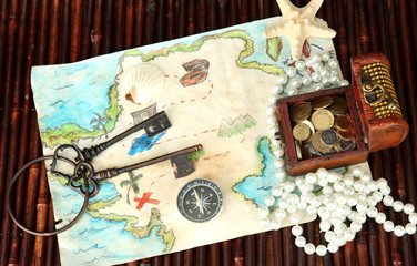 map of treasures on dark wooden background