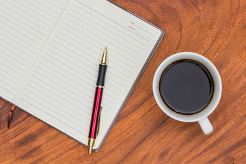 Upholstery Notebook and Pen with coffee