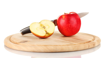 Red apple and knife on cutting board, isolated on white