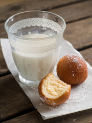 Doughnuts with glass of milk