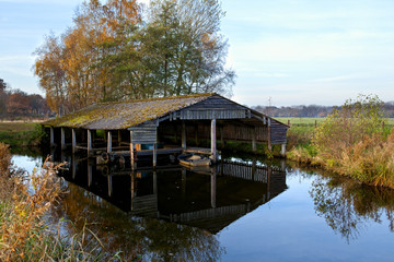 Fototapeta na wymiar wooden fisherman hut on water