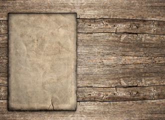 old paper sheet over rustic wooden background