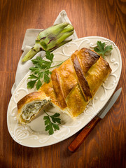 strudel with artichoke and ricotta, vegetarian food