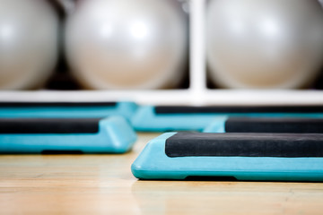 Step boards and gymnastic balls in sports class
