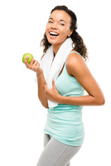 Healthy young mixed race woman holding green apple isolated on w