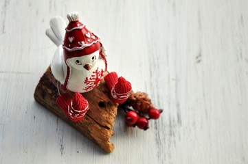 Ceramic bird with red hat and socks