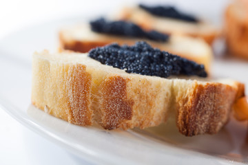 Crostini with salmon and caviar