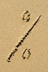 Symbol handwritten in sand