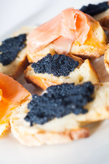 Crostini with salmon and caviar © JumalaSika ltd