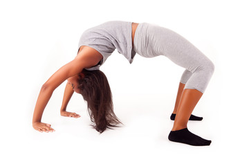 Pretty young african woman doing exercise