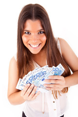 Portrait of a happy woman with a fan of Euros currency notes