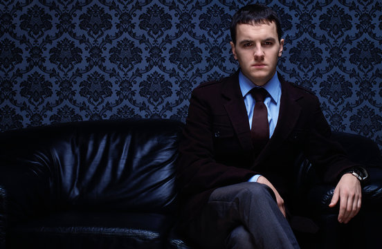 handsome fashionable aristocrate in a suit