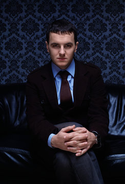 handsome fashionable aristocrate in a suit