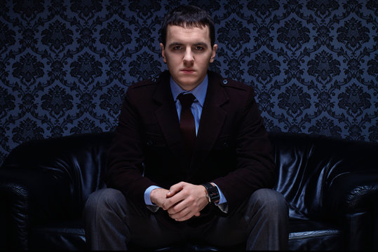 handsome fashionable aristocrate in a suit