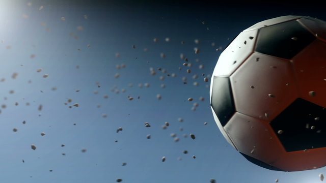 Computer generated soccer ball in slow motion (with particles)