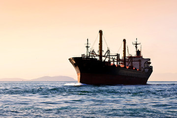 Silhouette of cargo ship