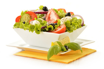 Vegetable salad bowl isolated on white