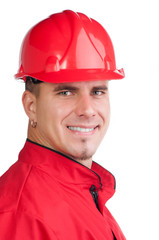 Portrait of young smiling fireman with hard hat