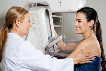 Doctor With Patient Getting Mammogram X-ray Test